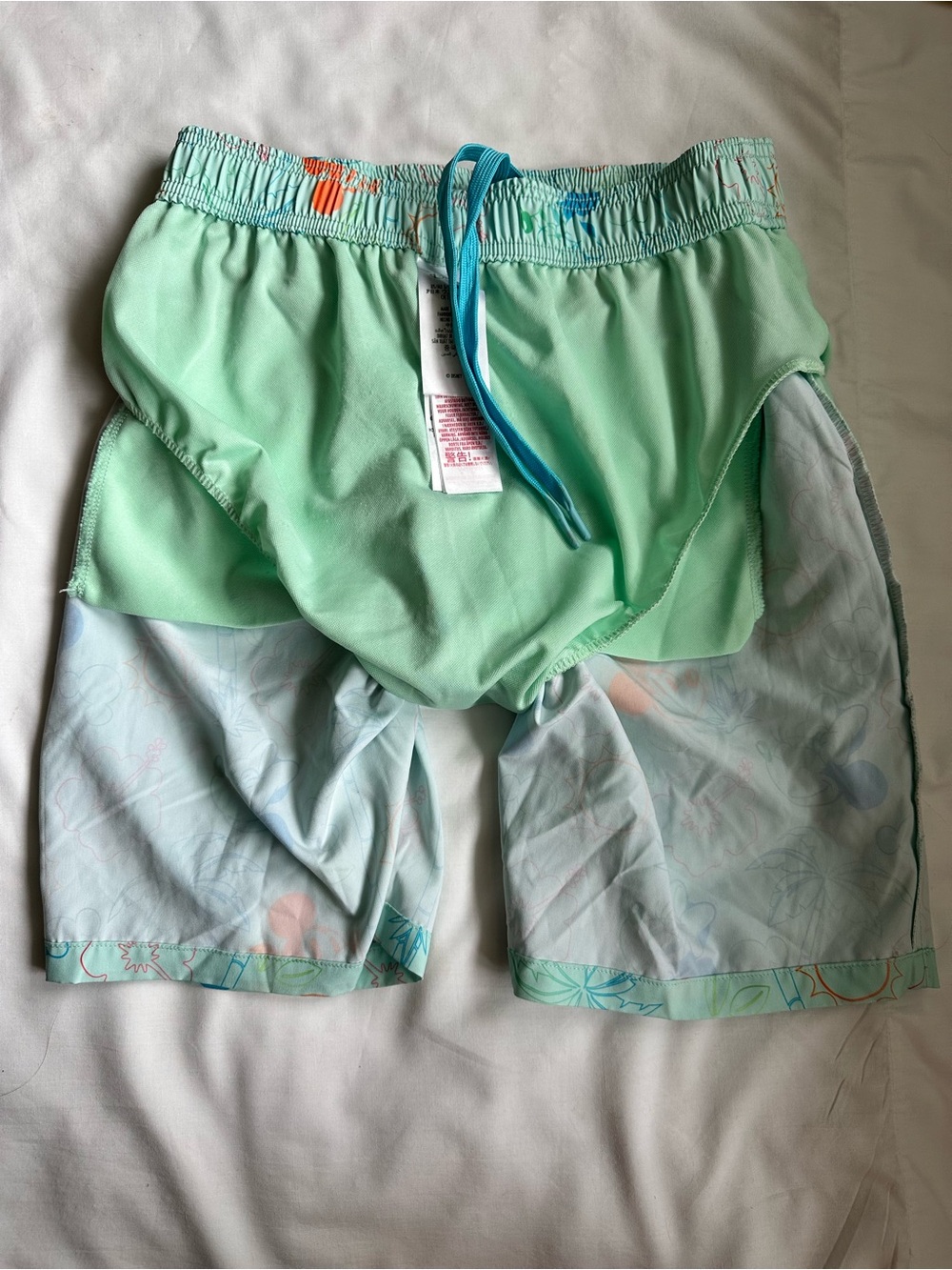 Disney Men’s Light Mint Blue Athletic Shorts with Orange & Blue Mickey Print - Picture 7 of 7